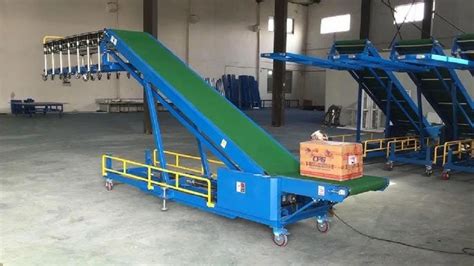 Truck Loader Conveyors - Truck Loading Machine Manufacture In Vadodara ...