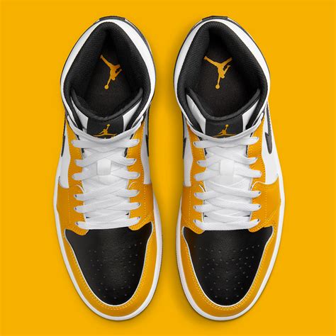Air Jordan 1 Mid "Yellow Ochre/Black" DQ8426-701 | SneakerNews.com