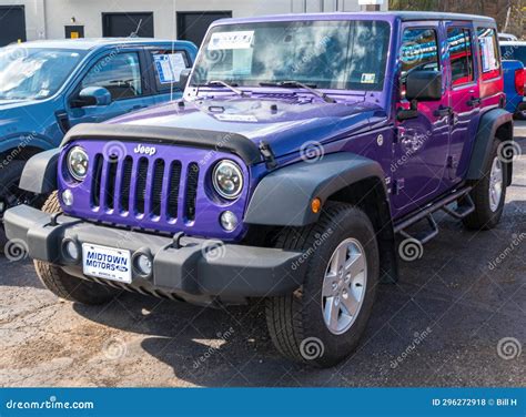 Purple Jeep Wrangler Parked In Rain On Roadside Turnout Editorial Image ...