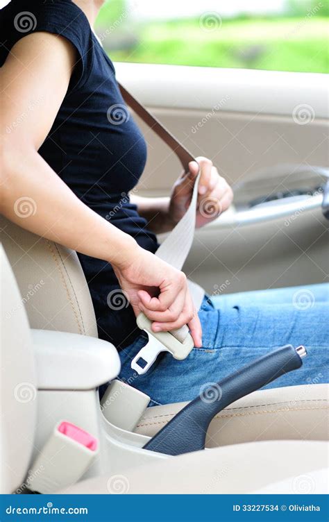 Woman fasten seatbelt stock photo. Image of safety, adult - 33227534