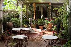 Courtyard Shade by Nyc Courtyard Garden Design Mediterranean Patio Bistro Courtyard Shade