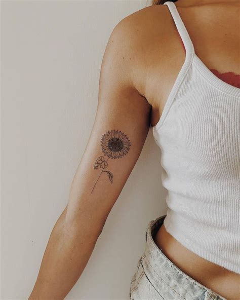 arm tattoo placement women