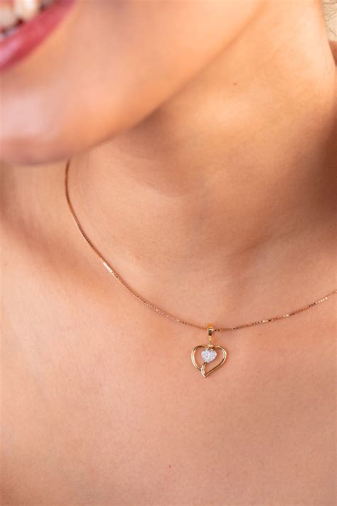 Heartloop diamond locket – Caratly