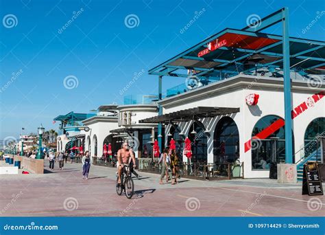 People Bike and Walk Along Mission Beach Boardwalk in San Diego ...