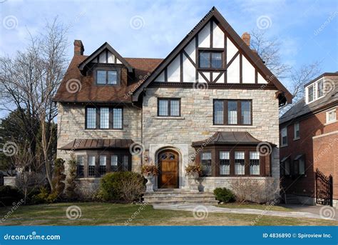 Suburban tudor style house stock photo. Image of lawn - 4836890