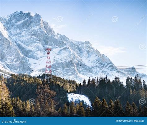 Scenic View of Zugspitze Mountains and a Cableway Tower on the Austria ...