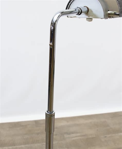 George Nelson | Floor lamp with a perforated shade | MutualArt