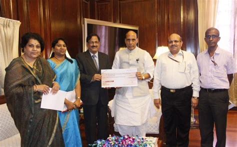 ‘Repco Bank’ Managing Director Shri R. Varadarajan presented a dividend ...