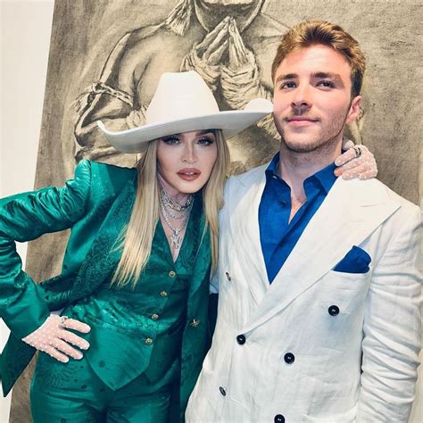 Madonna looks loved up with new boyfriend Akeem Morris, 28, ahead of ...