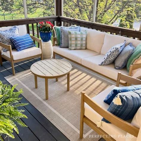 How We Made Our Small Screened Porch Look Bigger with a New Furniture ...