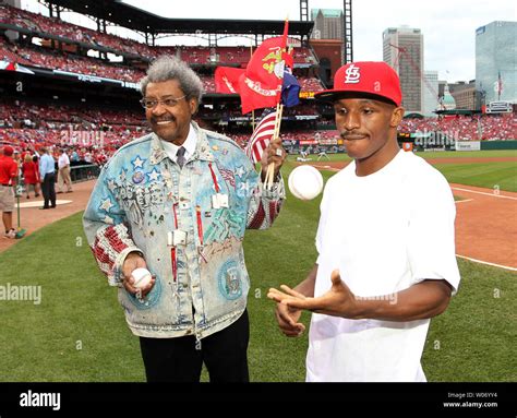 Boxing promoter Don King stands with boxer Devon Alexander as the two ...