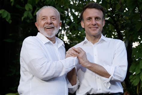 Macron quips about cuddly 'wedding' pics with Lula