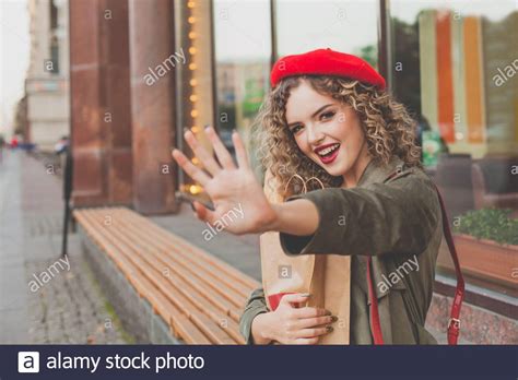 Blonde woman wearing trench coat hi-res stock photography and images ...