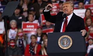 Image result for Trump vows retribution at rally