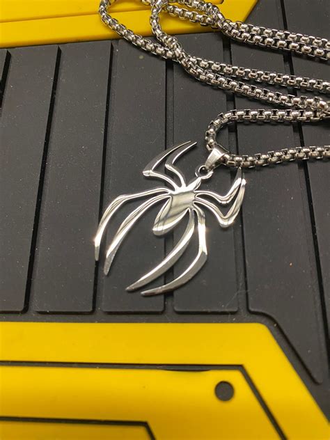 Spider Logo Pendant - Etsy | Dream jewelry, Funky jewelry, Cute jewelry