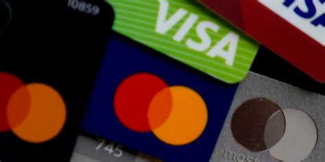 Federal judge temporarily halts Biden plan to lower credit card late ...