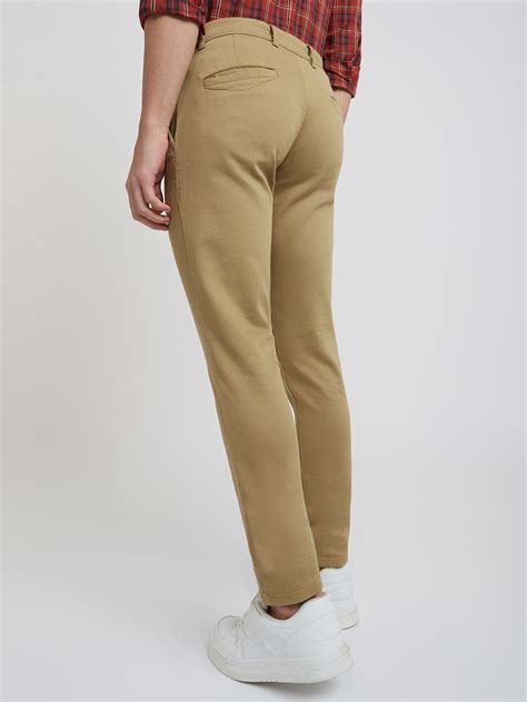Men Khaki Low Rise Tapered Fit Solid Cotton Blend Trouser – MyRaymond