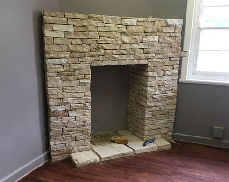 Stack Stone Fireplace 的图像结果