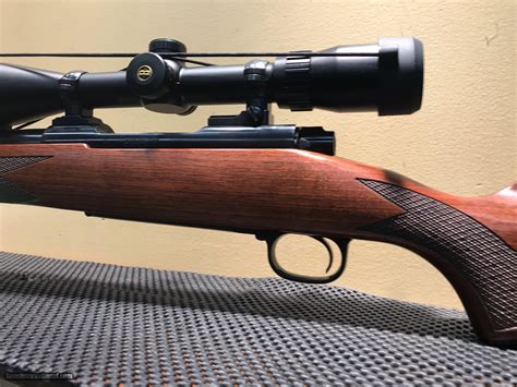 WINCHESTER MODEL 70, 300 WIN MAG WITH SCOPE
