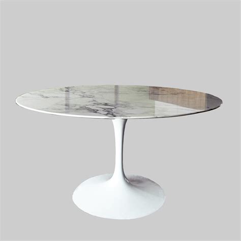 Saarinen dining table with Arabescato marble top produced by Knoll ...
