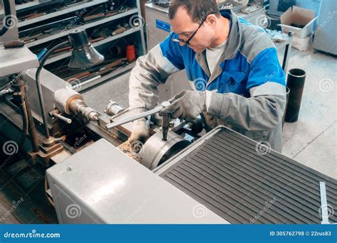 Portrait of Professional Turner at Work on Lathe in Workshop. Stock ...