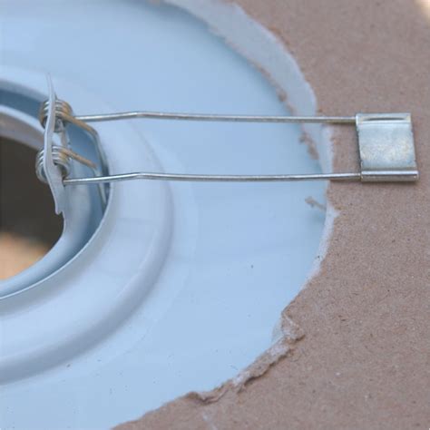 Image result for How Do Recessed Ceiling Spot Light Spring Clips Work