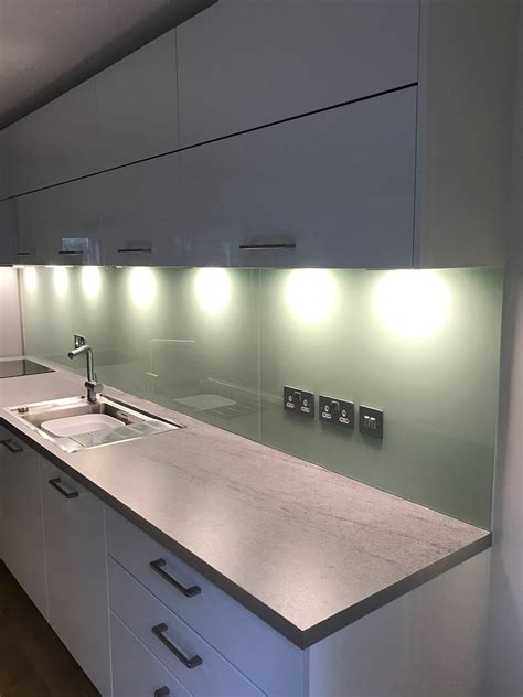 Copper coloured painted glass kitchen splashback. Copper splashback ...