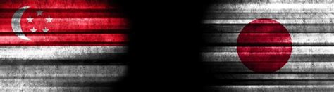 Singapore and japan flags on black | Premium Photo