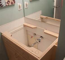 Bathroom Cabinet Installation by Installing A Bathroom Vanity Sink Bathroom Cabinet Installation