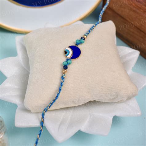 Buy Evil Eye Teardrop Bhaiya Bhabhi Rakhi Online in India - Mypoojabox.in
