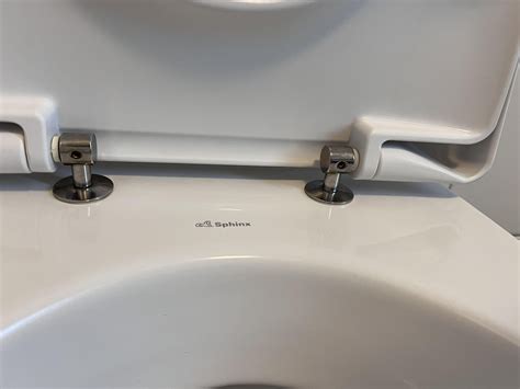 How to remove/tighten toilet lid : r/howto