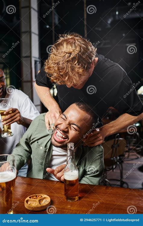 Redhead Man Tickling Happy African American Stock Image - Image of ...