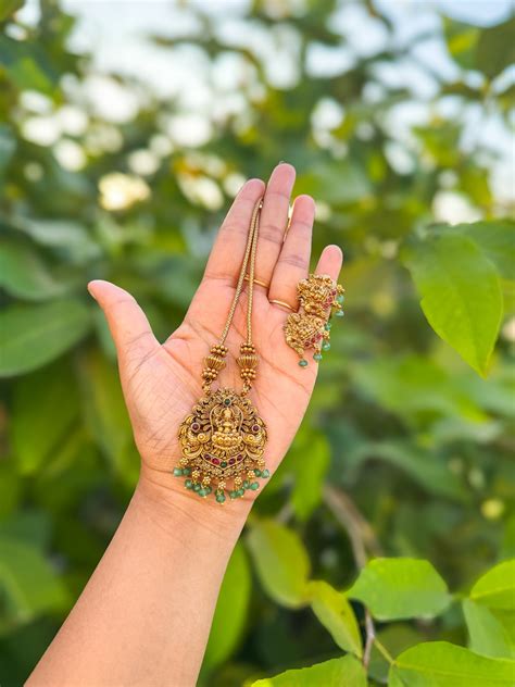 Chain with peacock lakshmi pendant with earing – Poli's Kart