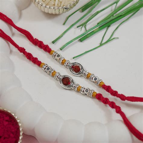 Rudraksh Rakhi Set with Roli Chawal & Rakshabandhan Card (Pack of 2)