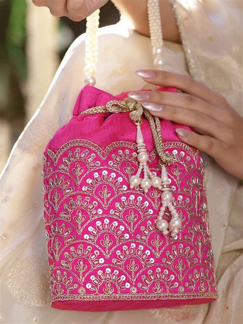 Rubans Bright Pink Potli Bag with Golden Zari Embroidery, Sequin Detai