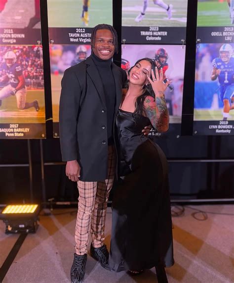 Heisman Winner Travis Hunter, Leanna Lenee’s Relationship Timeline | Us Weekly