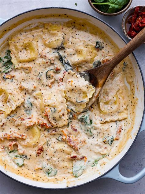 Indulge in this creamy Tuscan ravioli made with the most mouthwatering ...