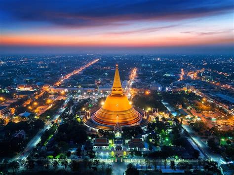 Aerial view of beautiful gloden pagoda at sunset. phra pathom chedi ...
