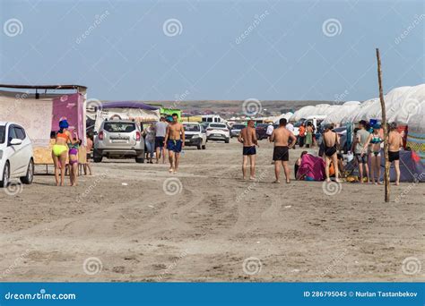 Rest on Lake Shalkar. People and Kazakh Yurts on the Lake. Beach ...