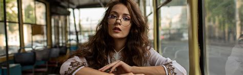 Download wallpaper girl, tram, brown hair, curls, Yuriy Korotun ...