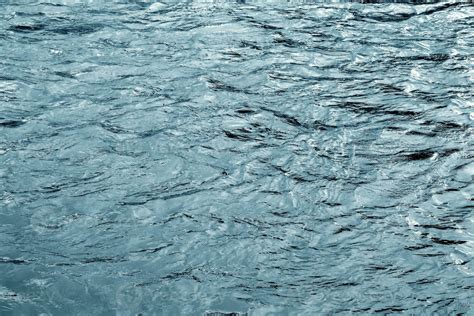 The texture of the water of the river. Natural water background with ...