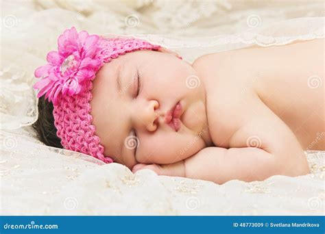 Baby sleeping on stomach stock image. Image of cheerful - 48773009