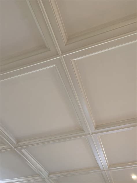 White Ceiling with Crown Molding and Lights