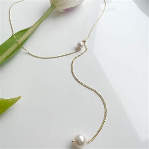 Pearl ball slide necklace | a little