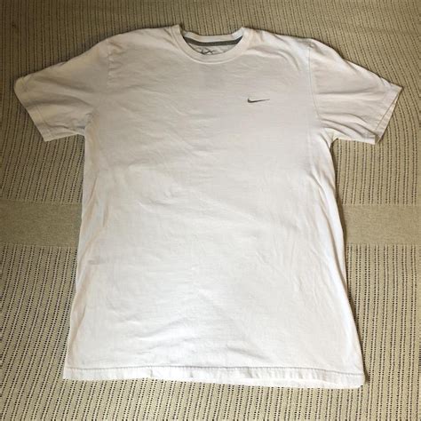 Nike regular fit white tshirt, stitched chest logo... - Depop