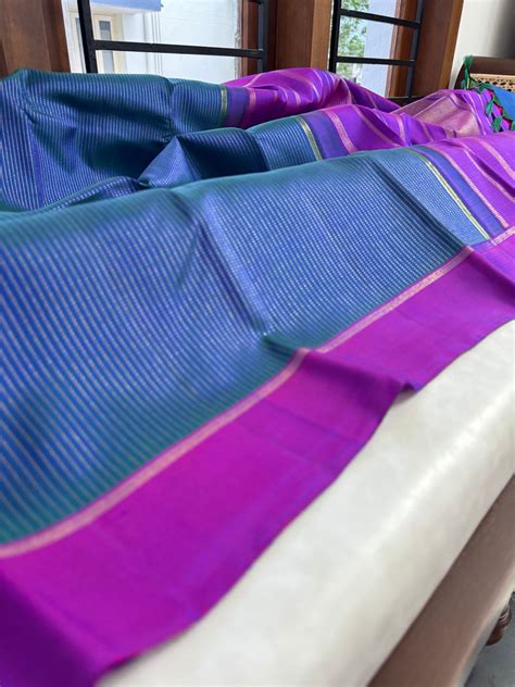 Colour Theory - a simple and elegant dual tone peacock blue green rais ...