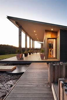 house with funky roof angles single pitch roof exterior farmhouse with shading wooden house with funky roof angles single pitch roof exterior farmhouse with shading wooden