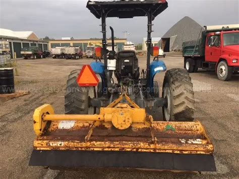 2000 New Holland TN65D and Alamo SH74 Mott/mower | GovDeals