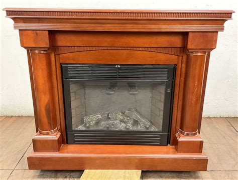 At Auction: Traditional Twin Star Electric Fireplace