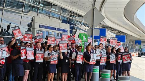 American Airlines flight attendants overwhelmingly vote for strike ...